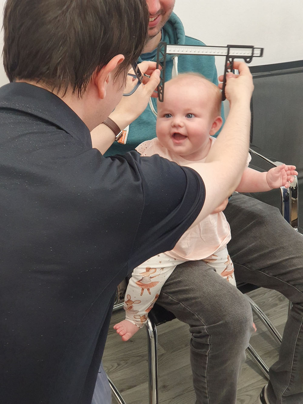 Baby Rosie during a plagiocephaly helmet therapy fitting appointment