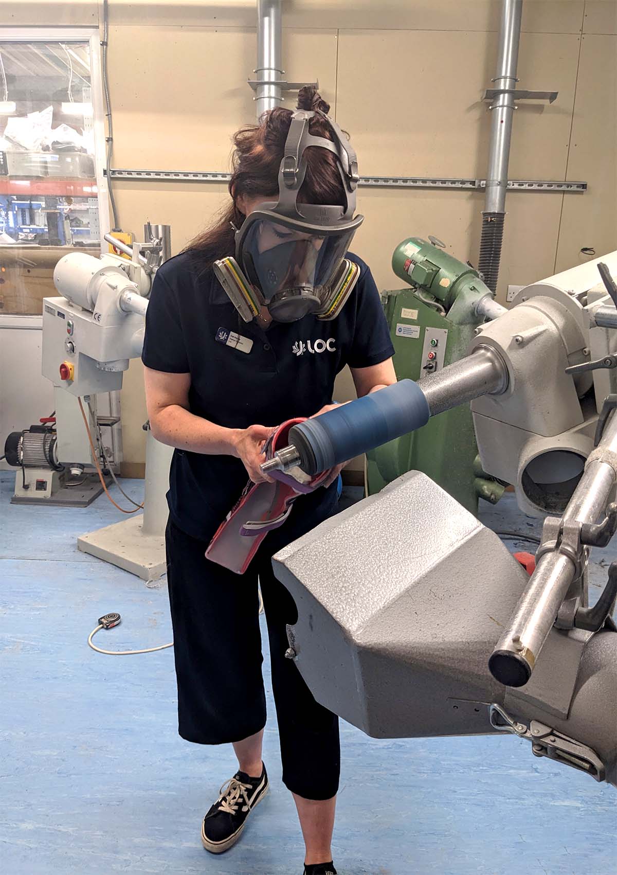 Cat Hendy working on an orthosis in the manufacturing workshop