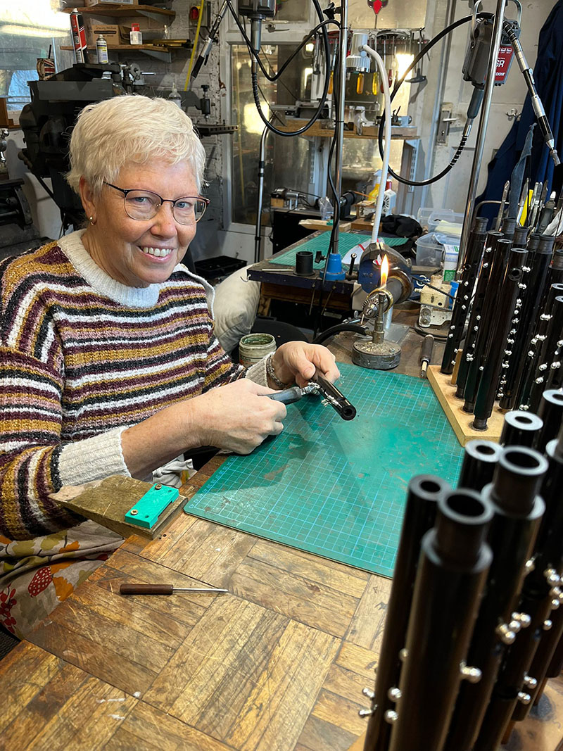 Gill (who makes musical instruments for a living) at work